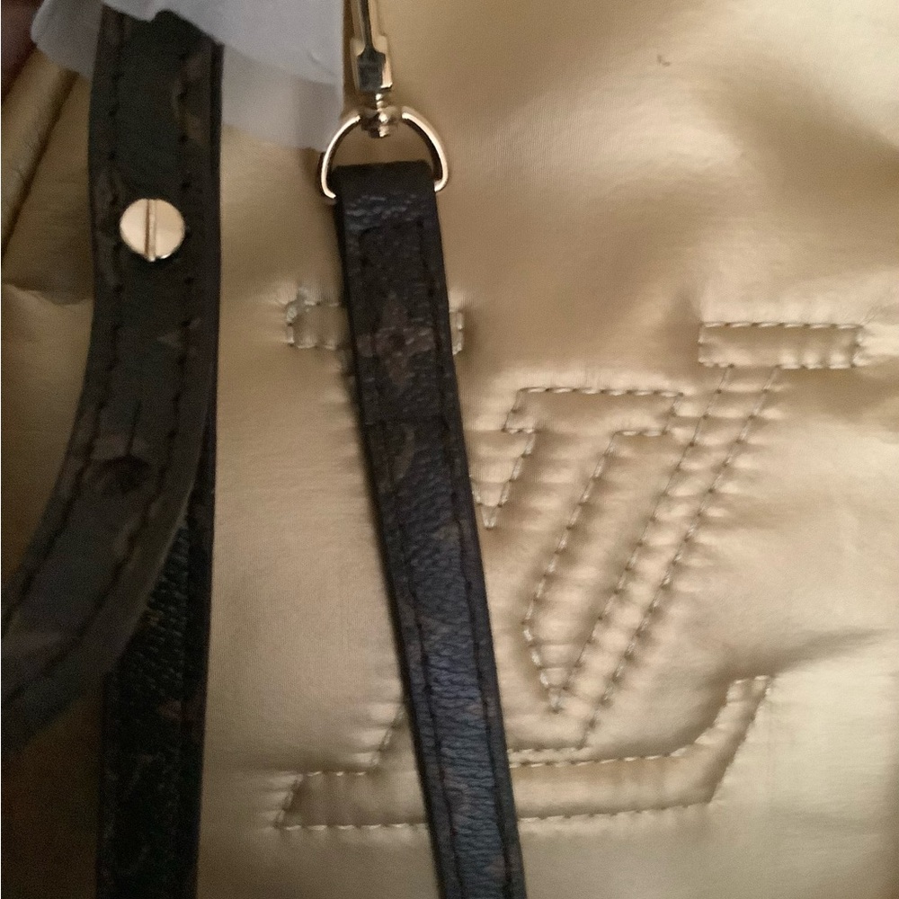 Gold /Brown mini Backpack
Experience luxury backpack - Picture 3 of 3